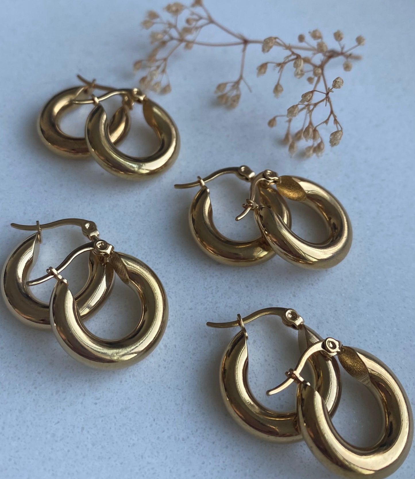 Chunky gold hoops earrings